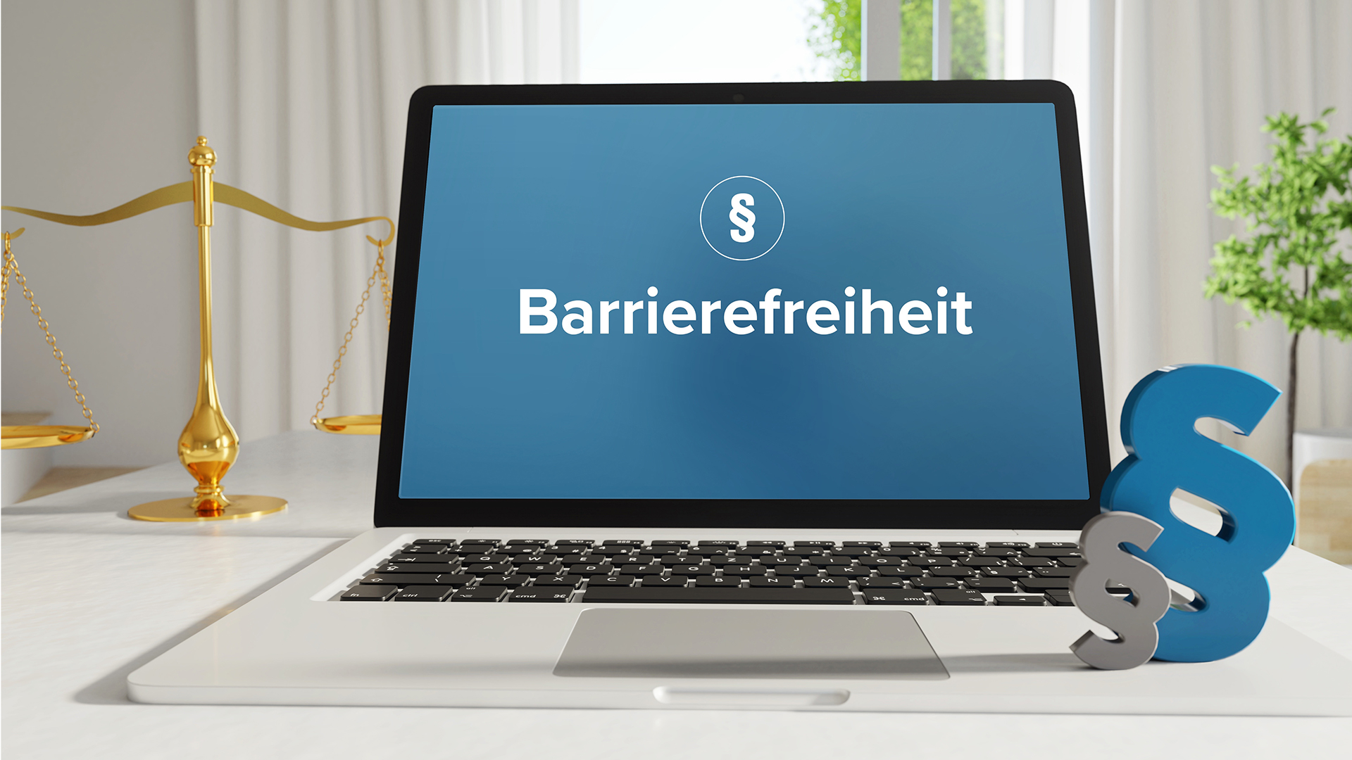 Aufgeklappter Laptop mit dem Wort "Barrierefreiheit" auf dem Bidschirm.